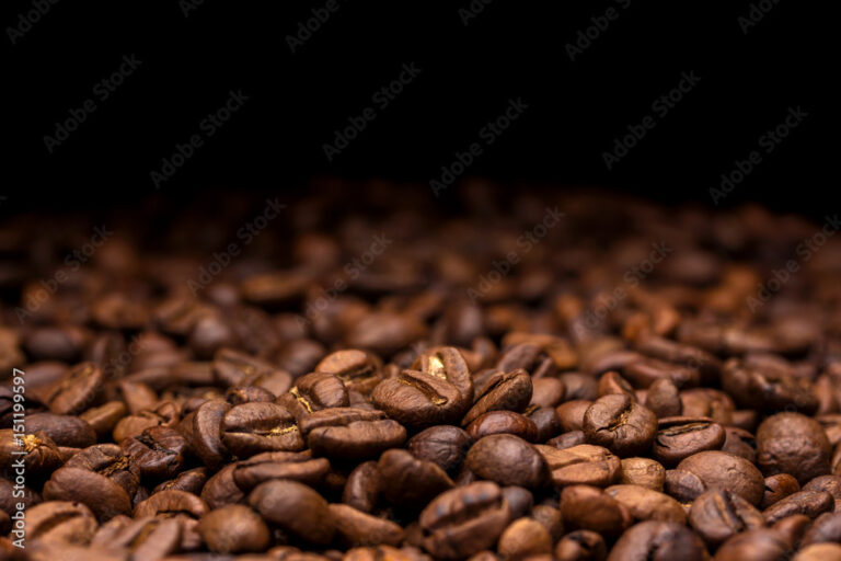 Coffee beans. Dark background with copy space, close-up