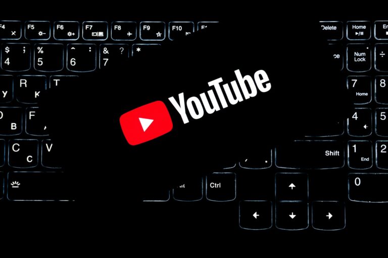 Youtube logo on a backlit keyboard.